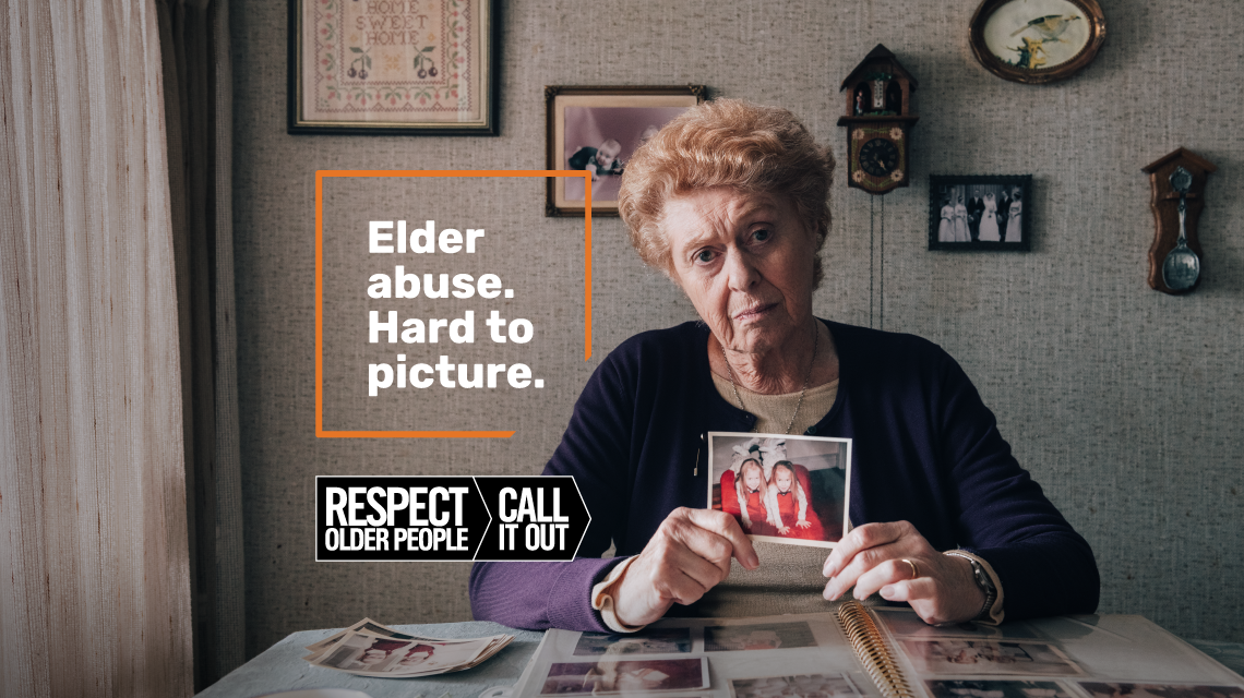 elderly-woman-looking-unhappy-holding-a-photograph-of-her-two-young-children-in-her-home-Text-reads-elder-abuse-Hard-to-picture.-Respect-older-people-Call-it-Out