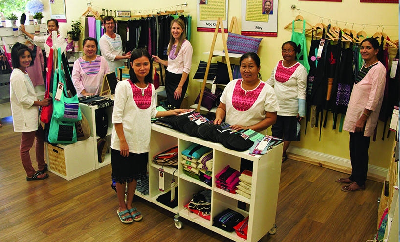 Paw Po Products staff in their shop