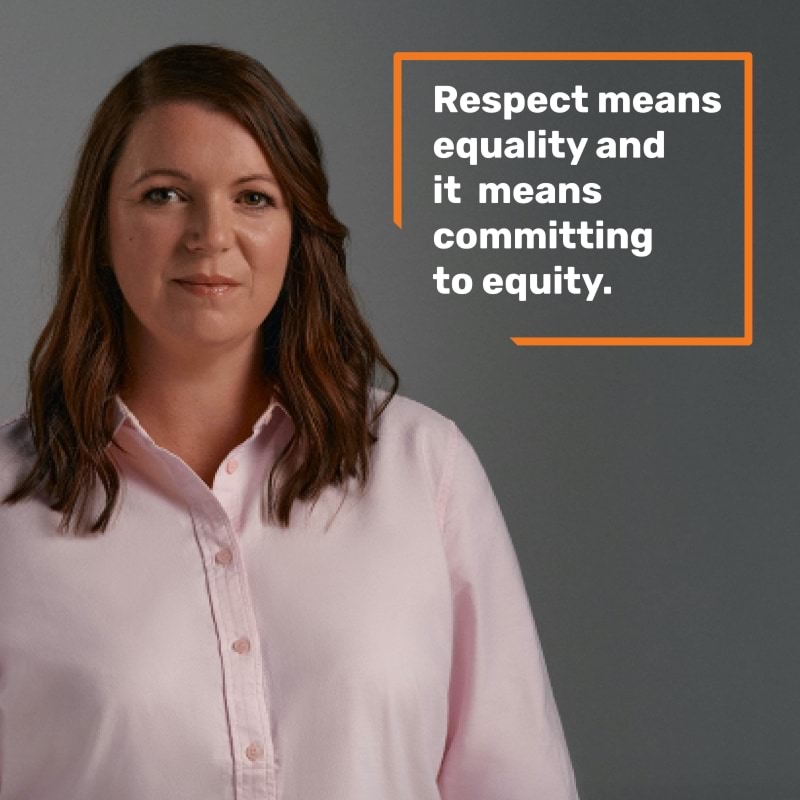 A photo with a quote in orange and white text which reads “Respect means equality and it means committing to equity.’