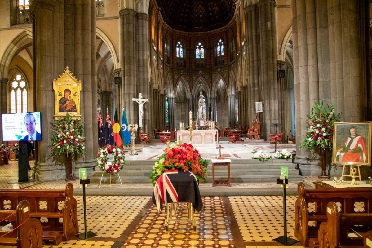 Sir James’ coffin was draped in an Australian flag, with a portrait of himself as Governor also on display