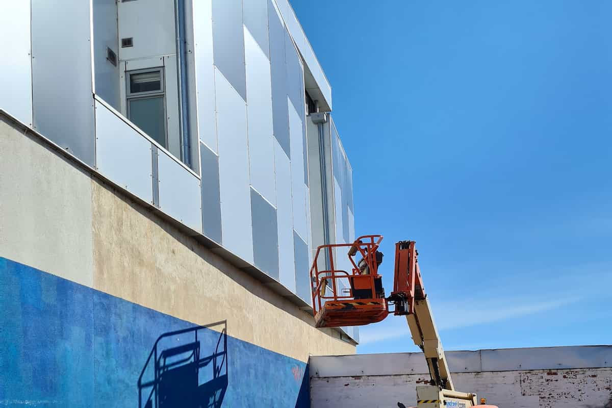 A building set against a blue sky. 