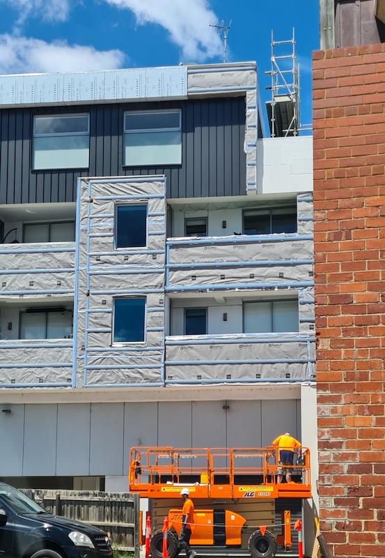 An apartment building under construction. 