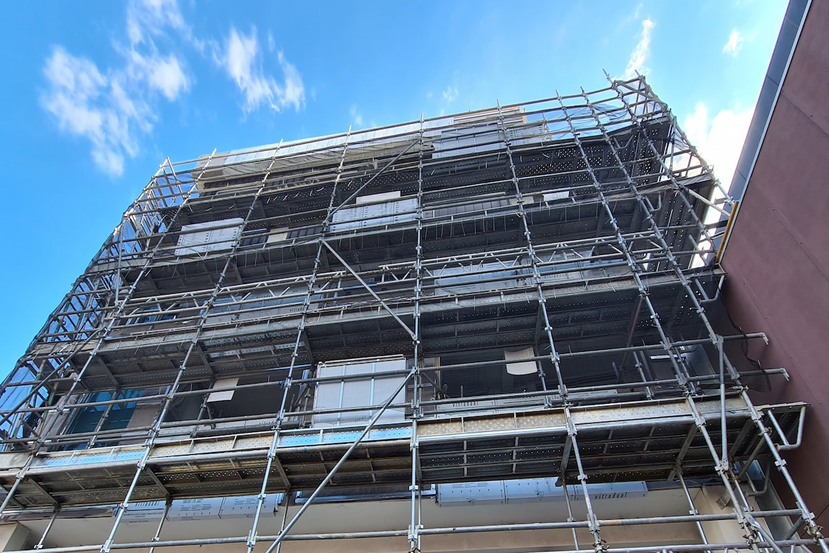 An apartment building under construction. 