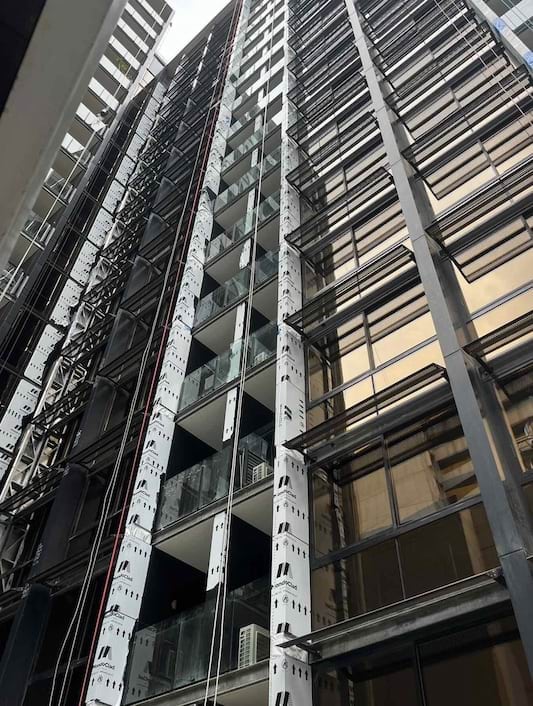 A high rise apartment building undergoing cladding rectification 