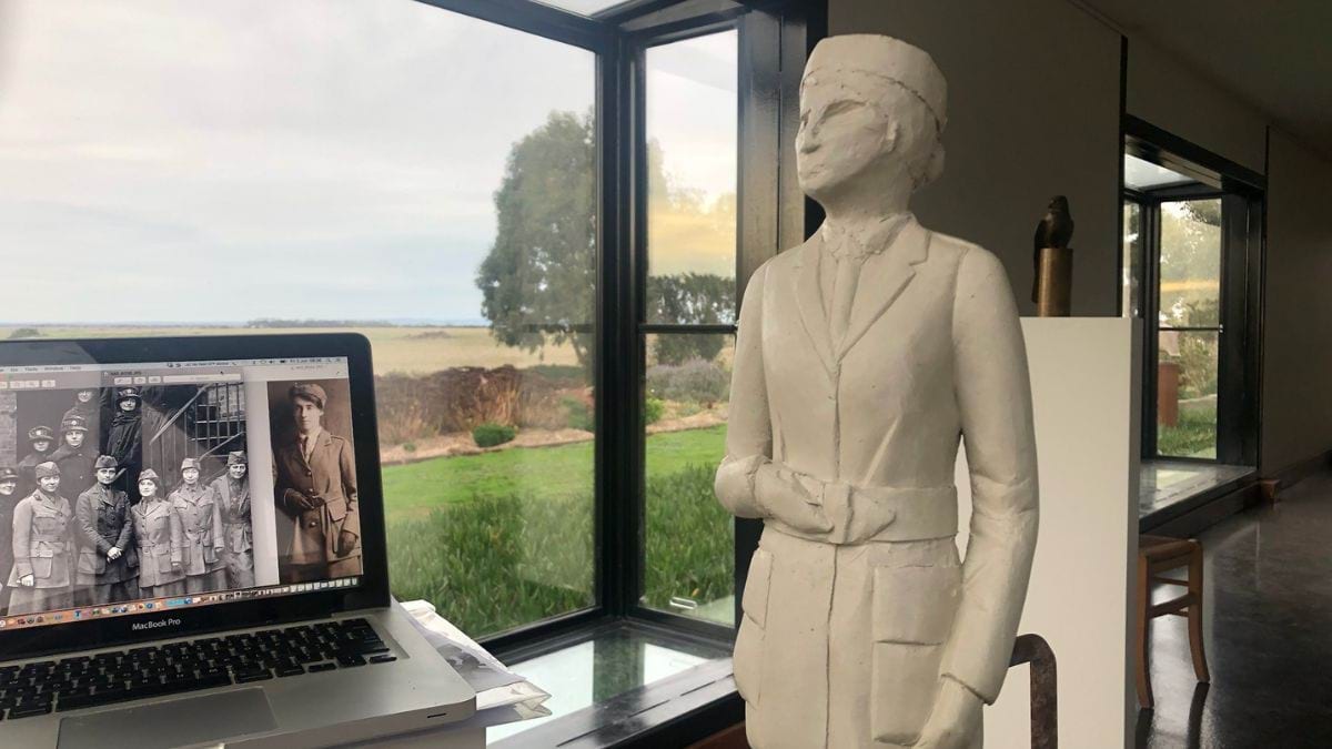 In the studio, the sculpture of Vera is in progress. The artist, Lucy McEachern, has photographs of Vera's time in service during World War One on her computer for reference and inspiration.