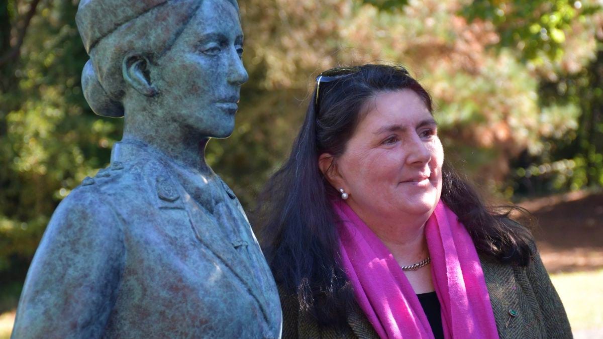 Sculptor Lucy McEachern with the bronze statue of Dr Vera Scantlebury Brown.