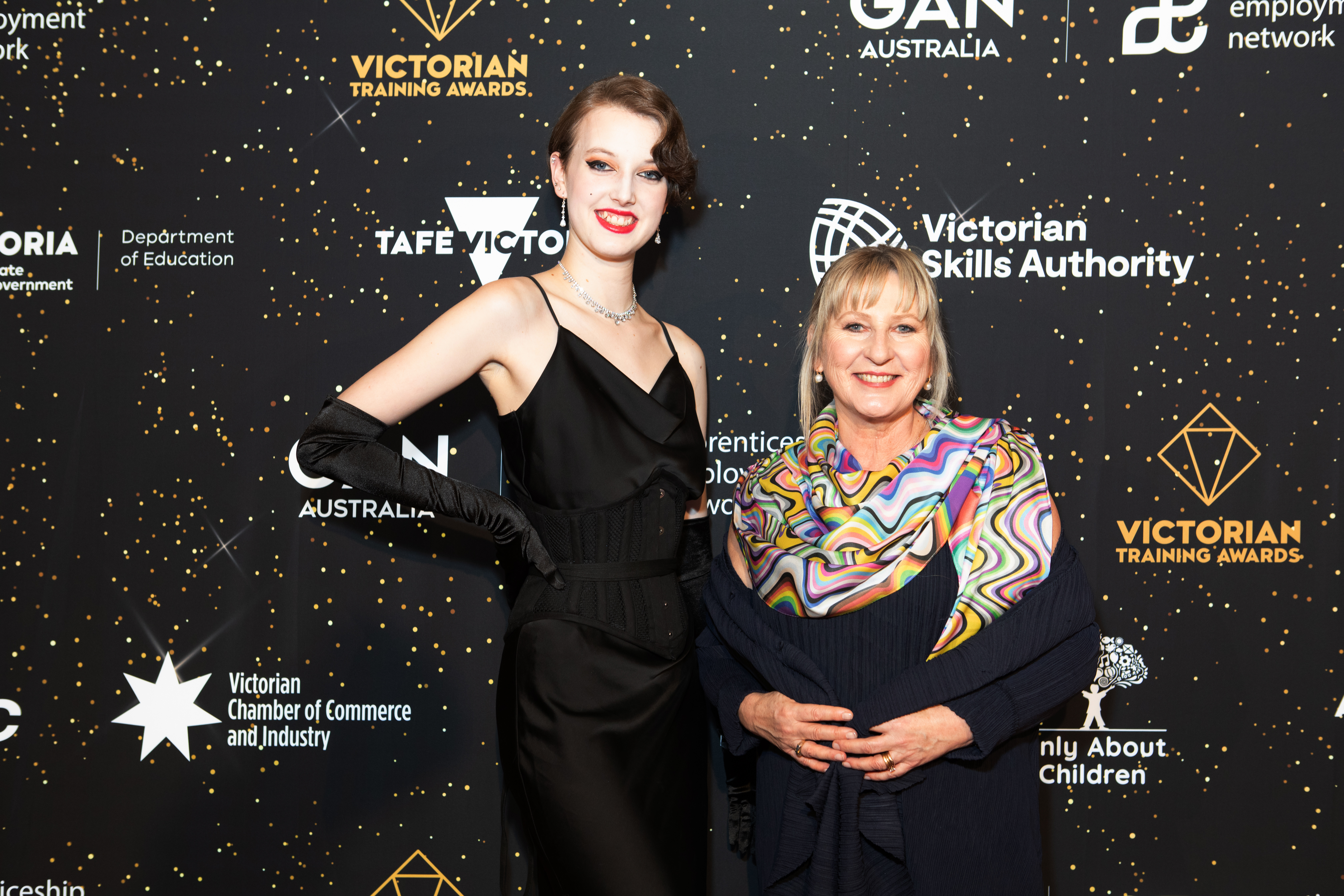 Fashion designer TJ van der Meulen with Minister Tierney at 2023 Victorian Training Awards