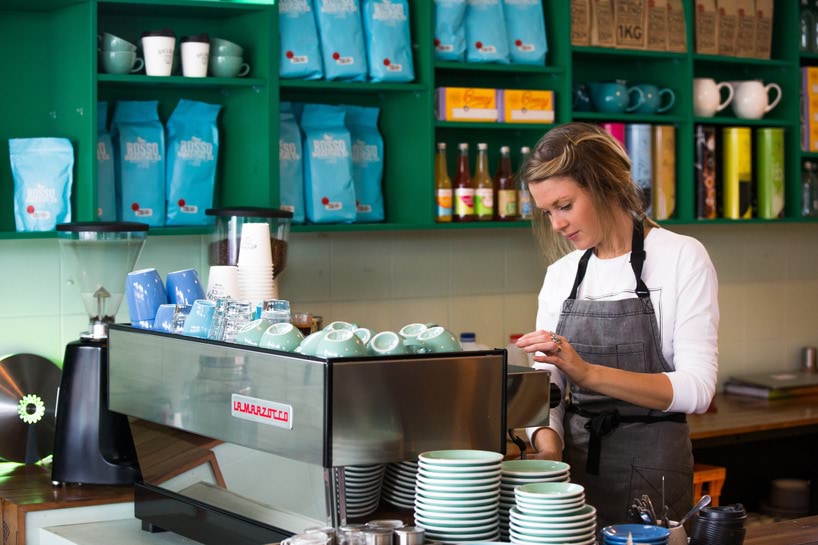 Victorian Skills Authority Connecting Industry with Skills female barista at coffee machine in cafe environment