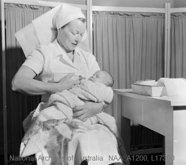 Baby being feed by a nurse at Mother Craft Clinic, Canberra