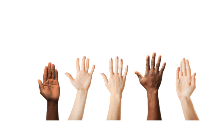 Image shows a group of hands in the air