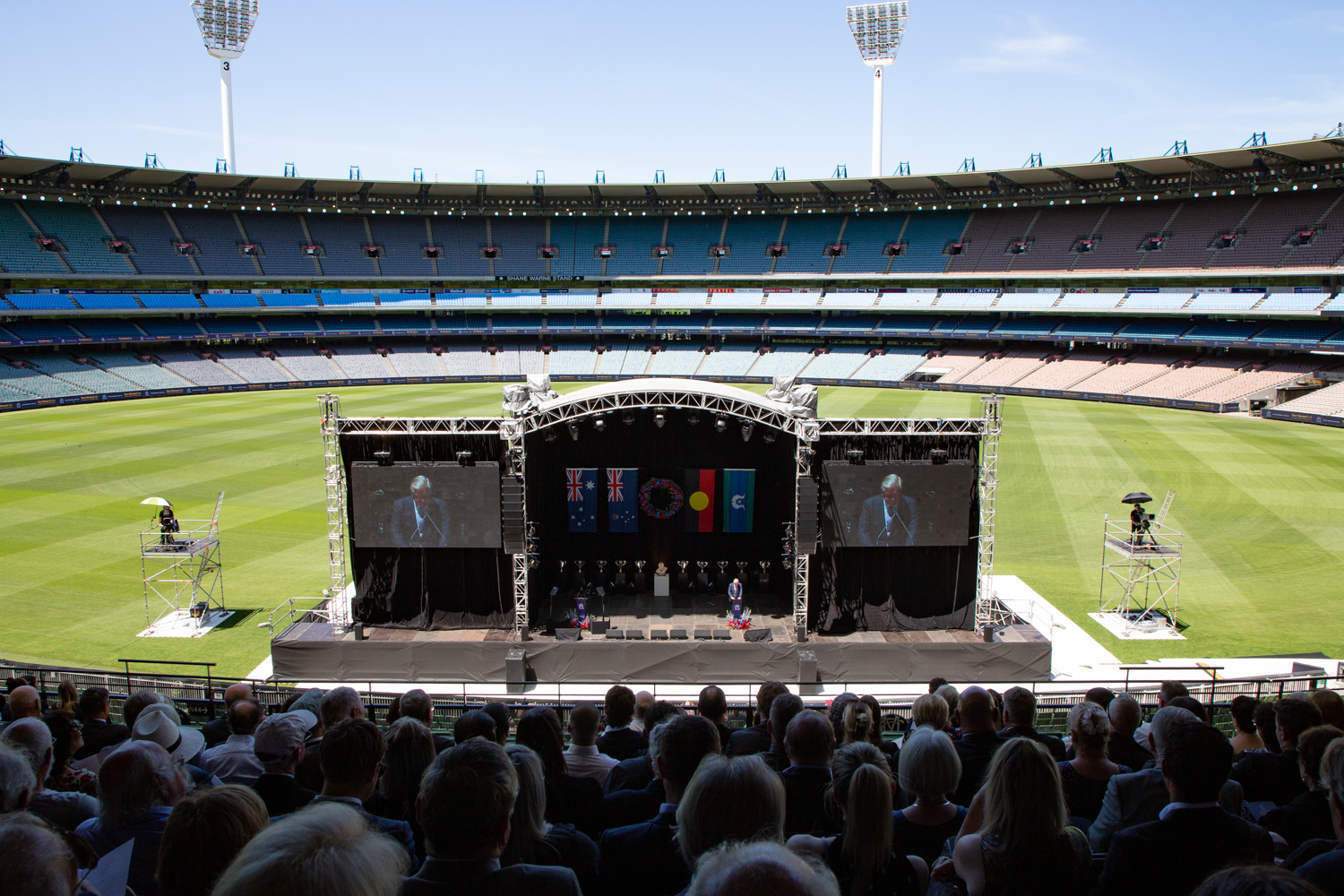 A picture from the level one audience stands that shows the stage on the MCG grass and the audience 