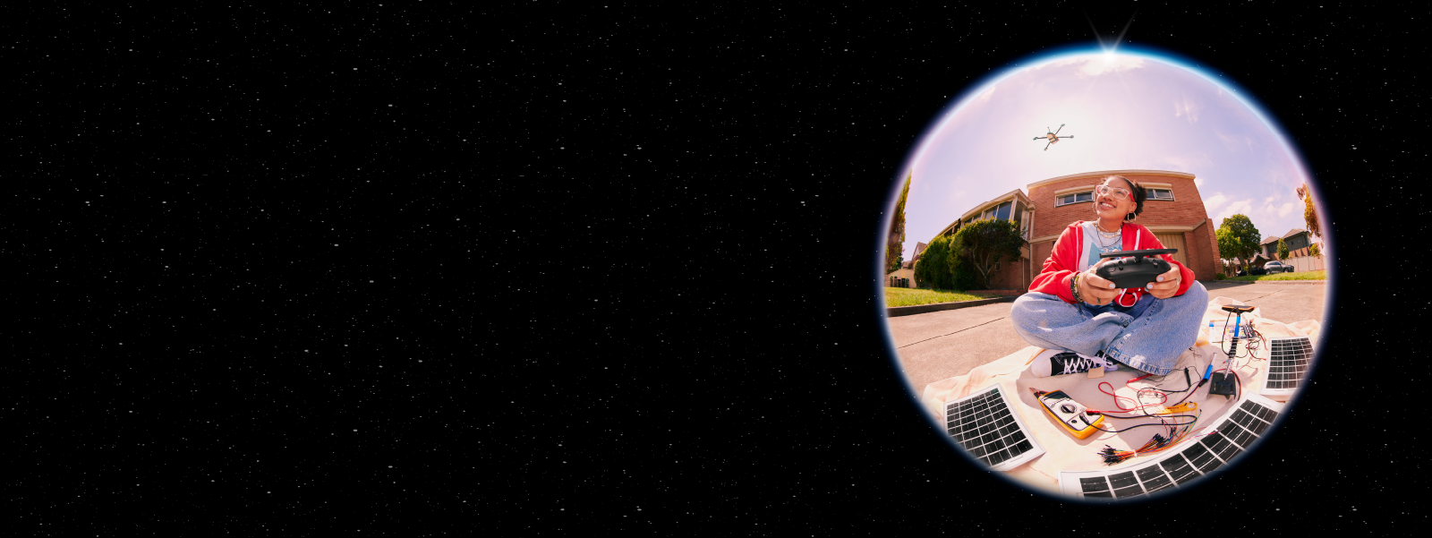 teenage girl operating a solar powered drone