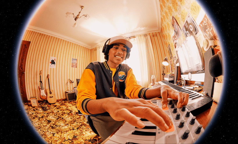 teenage boy playing electric keyboard