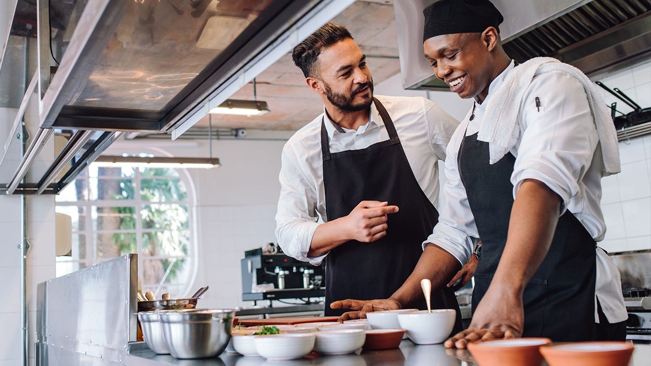 Chefs working in commercial kitchen