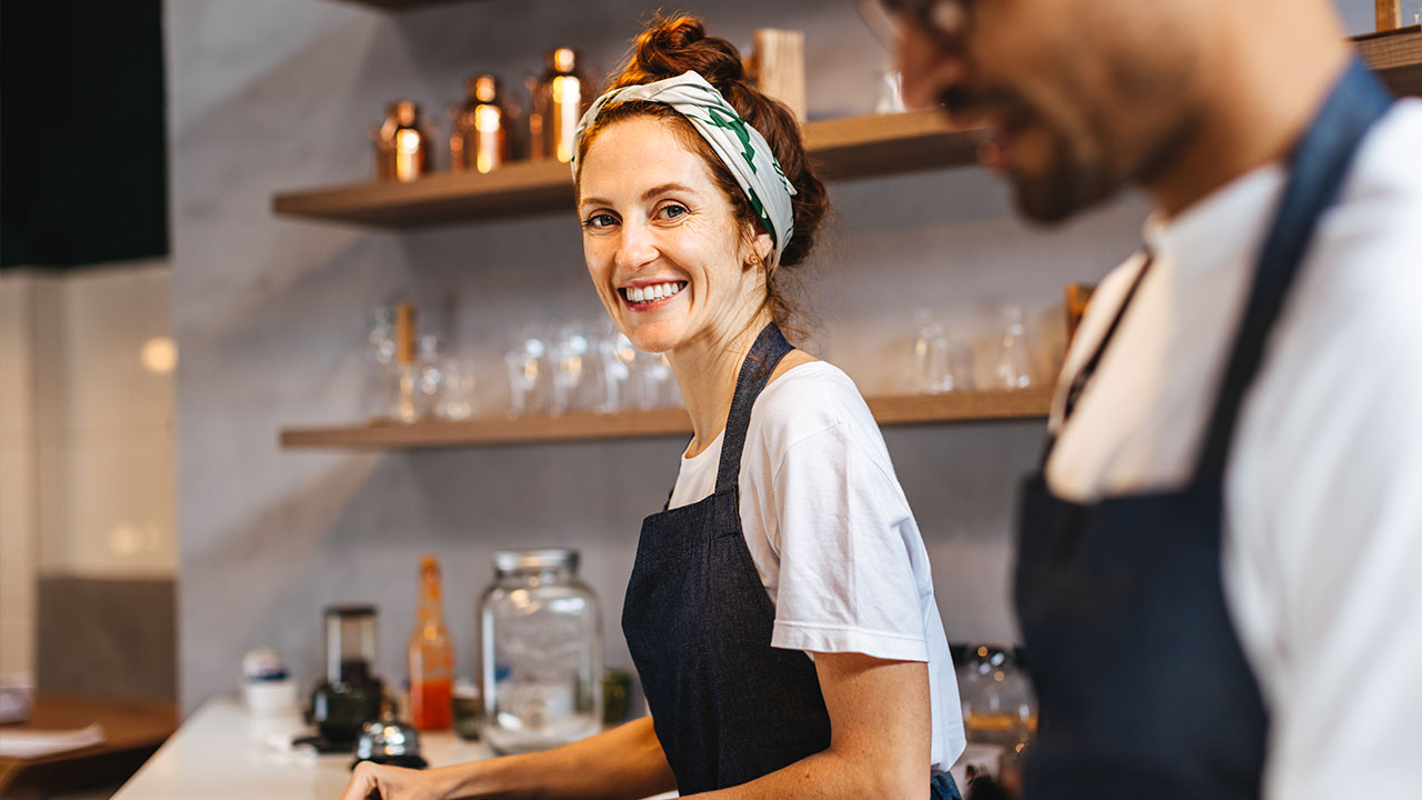 Cafe worker at counter