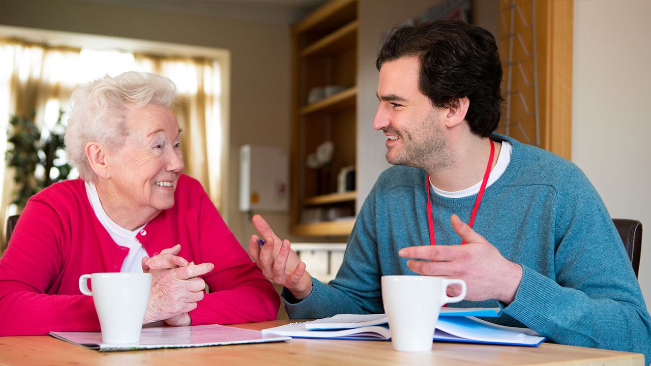 Elderly person and aged care worker