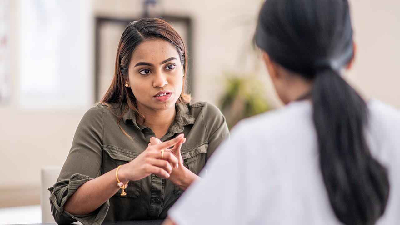 Counsellor listening to client