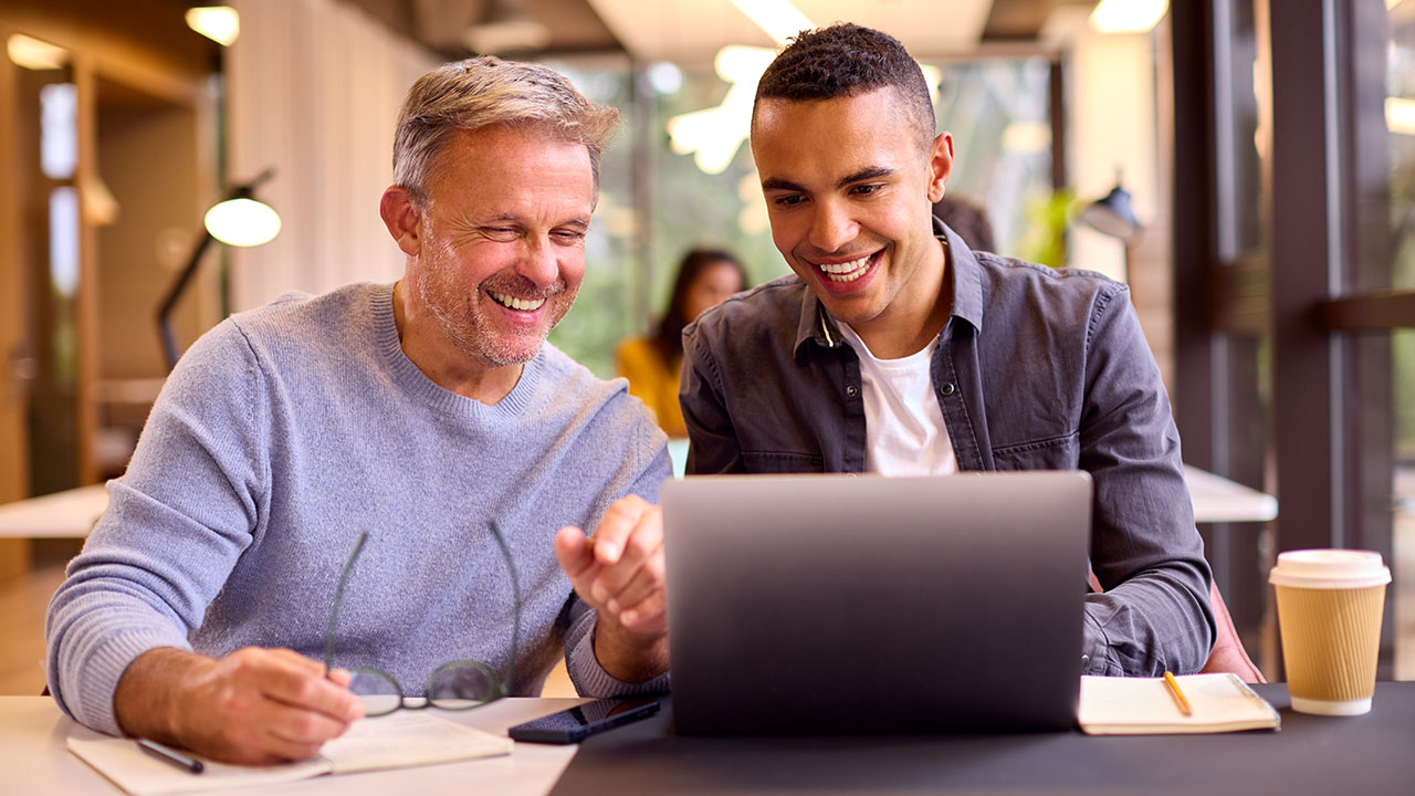 Person looking into the camera in an adult learning setting