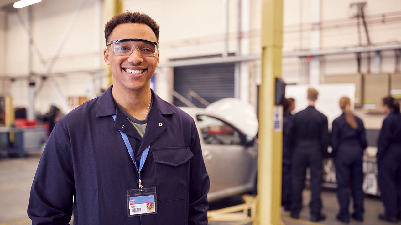 Mechanic apprentice in workshop