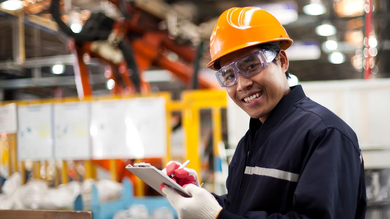 Manufacturing worker with check list