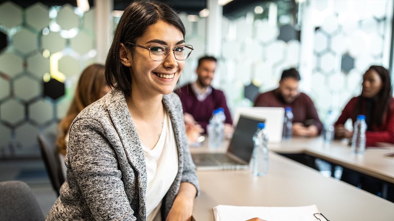 Person looking into the camera in training setting