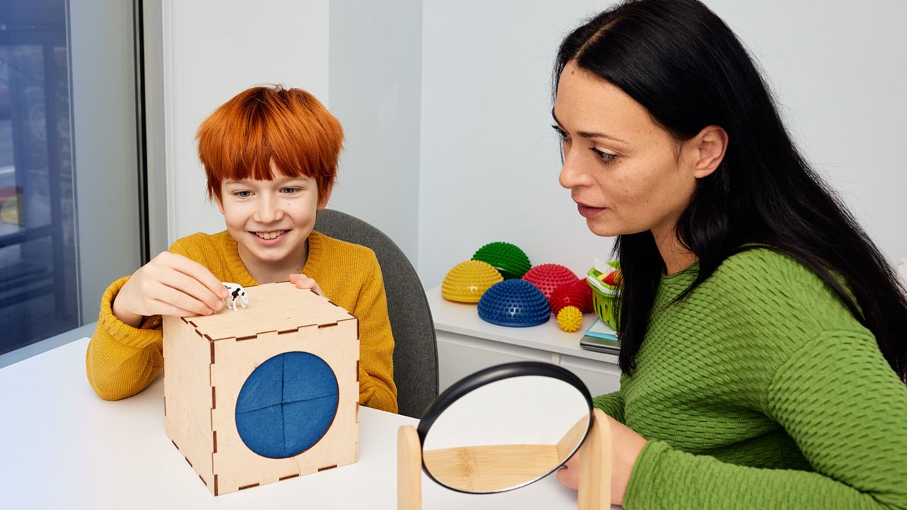 Educator working with child