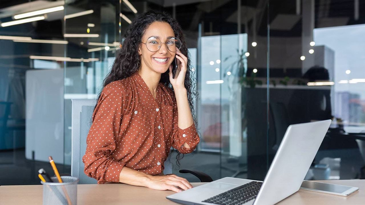 Person at desk with laptop