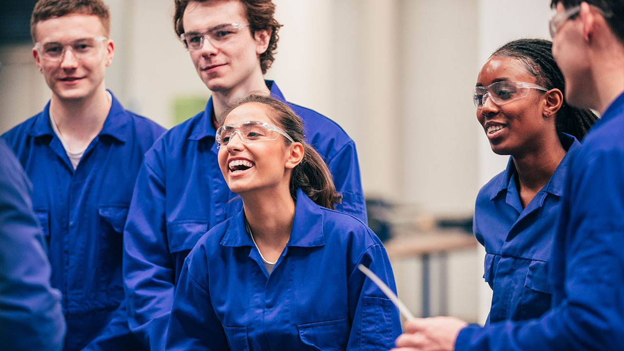 Group of trainees in manufacturing setting