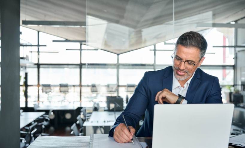 Person in an office using a laptop