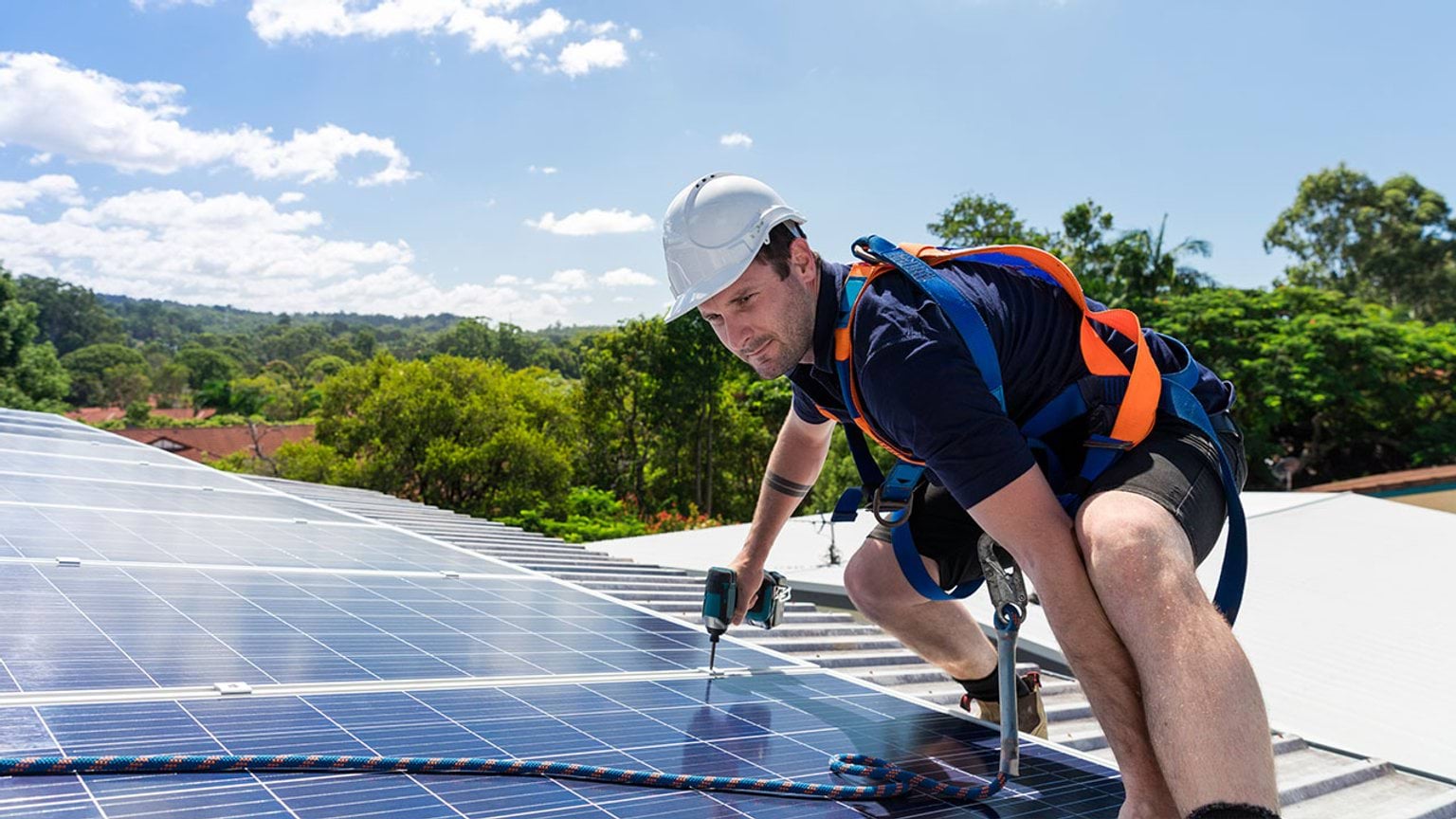 Solar panel being installed on rooftop