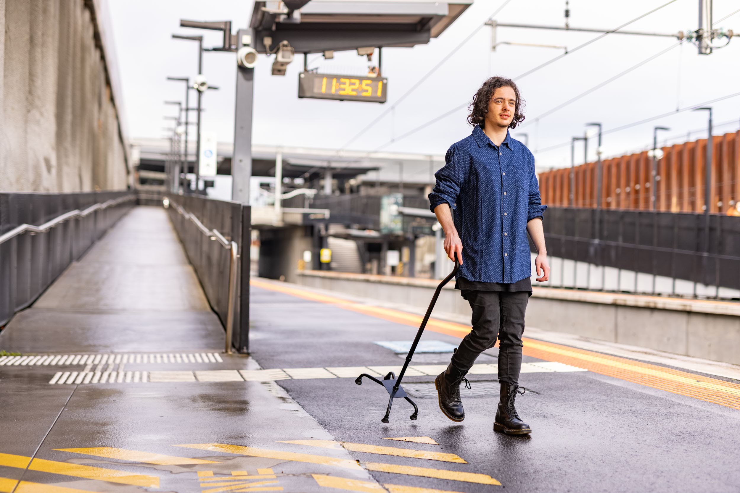 Person walking on a train platform