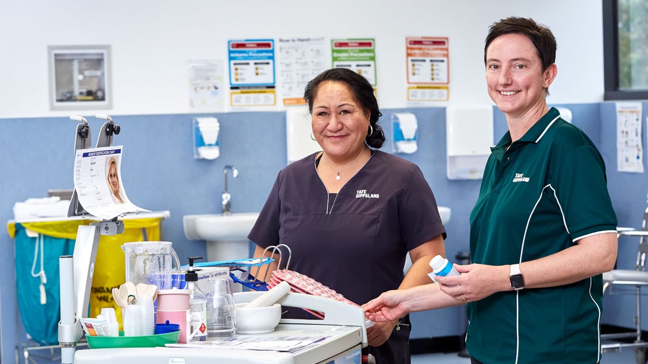 Two medical practitioners in a lab