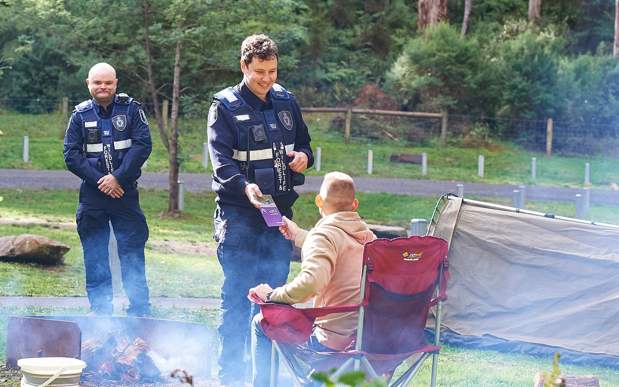Authorised officers educating park visitors
