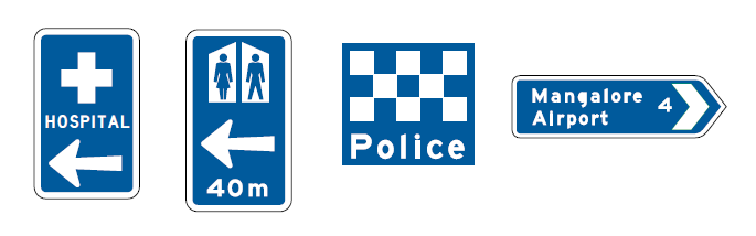 Image of signs showing hospital, toilets, police station and Mangaliore airport