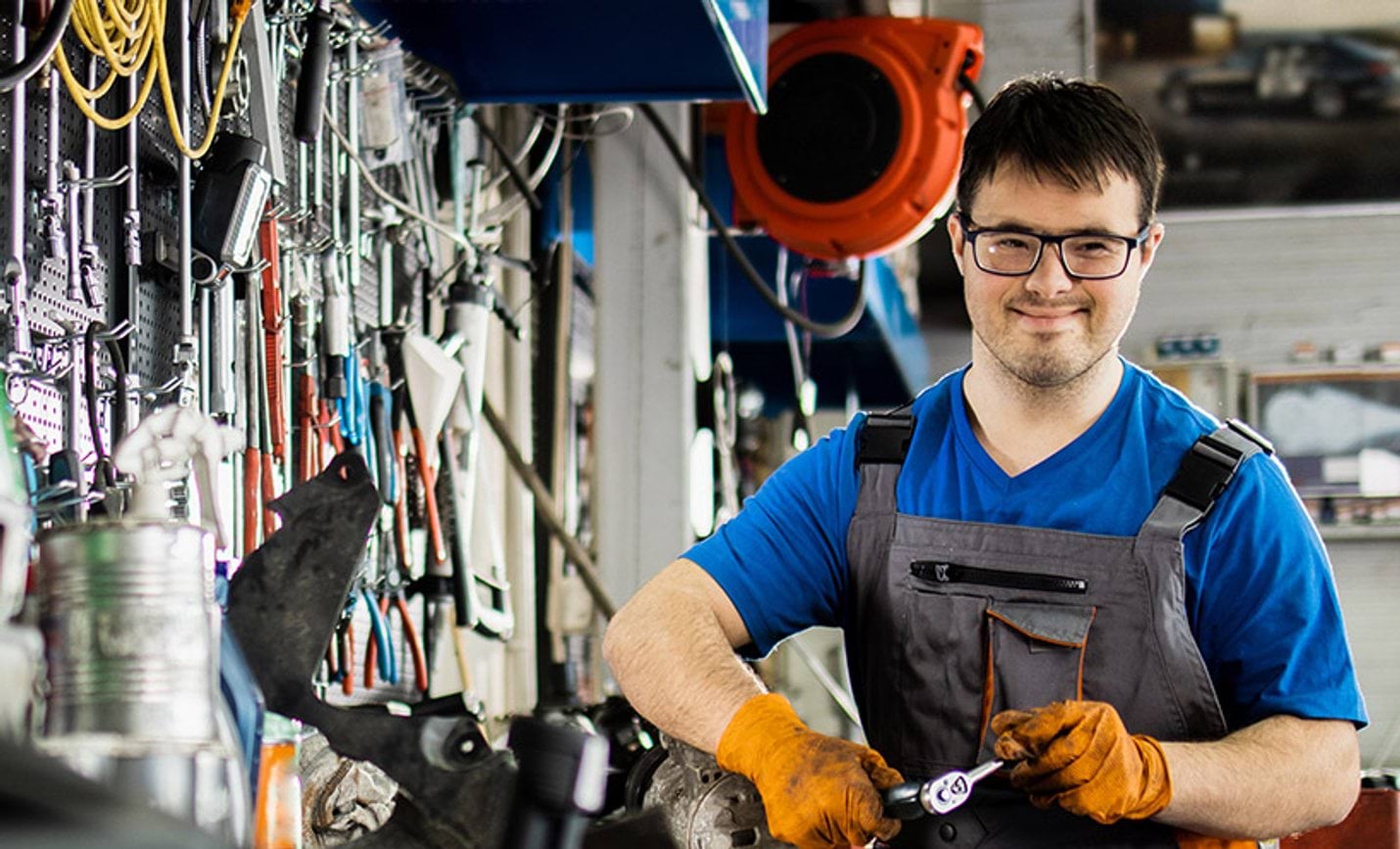 A mechanic in an auto repair shop