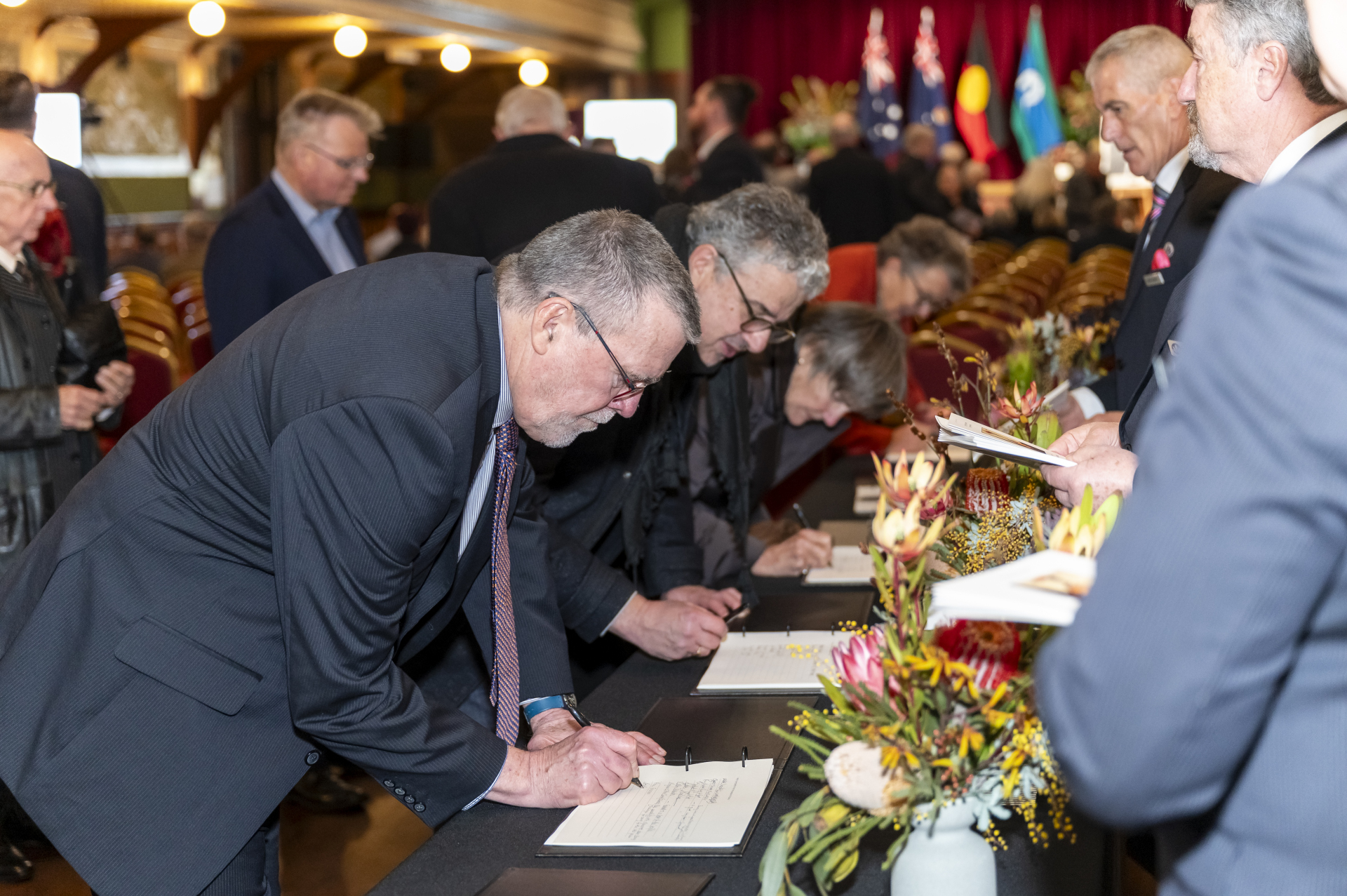State Funeral Service for The Honourable Barry Pullen - Guests signing condolence books