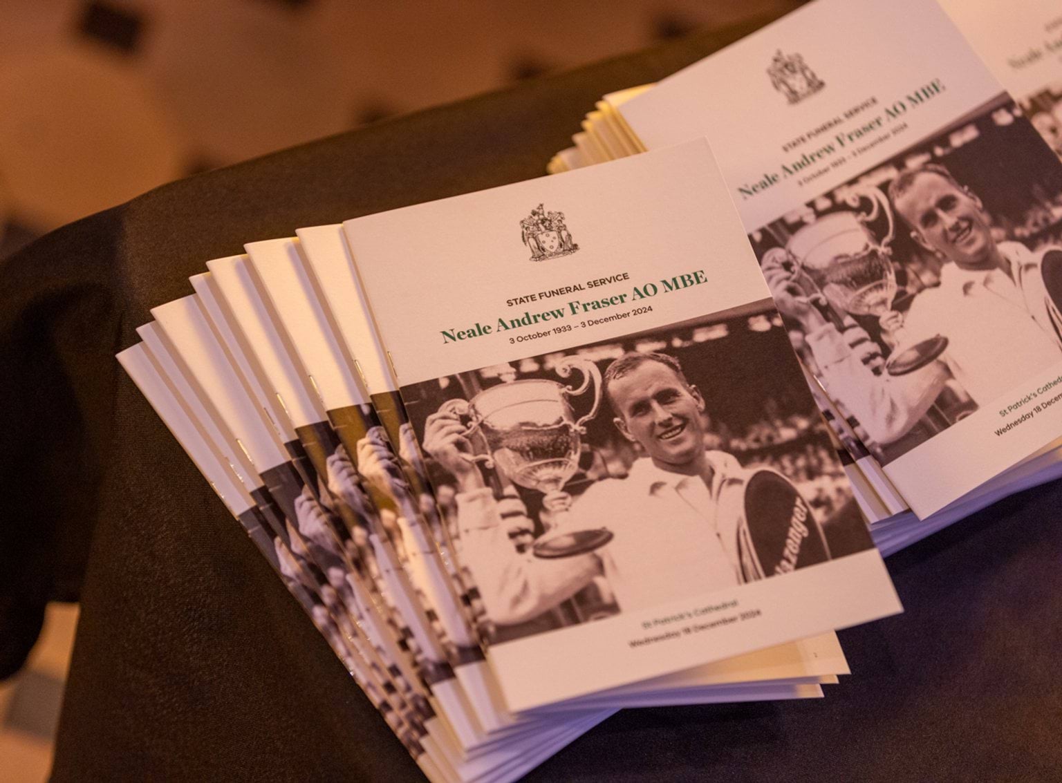 Funeral service programs at the State Funeral Service for Neale Fraser AO MBE