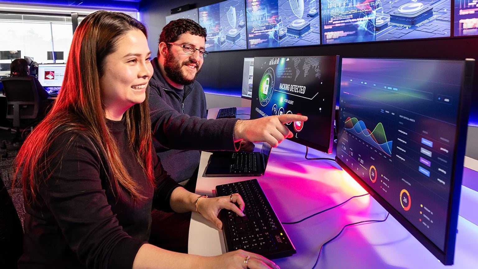 A student and teacher looking at two computer screens - Victorian Skills Plan for 2025 into 2026 cover image